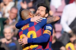 Arturo Vidal & Lionel Messi of FC Barcelona