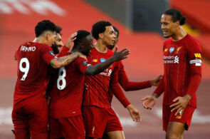 Naby Keita celebrates with teammates