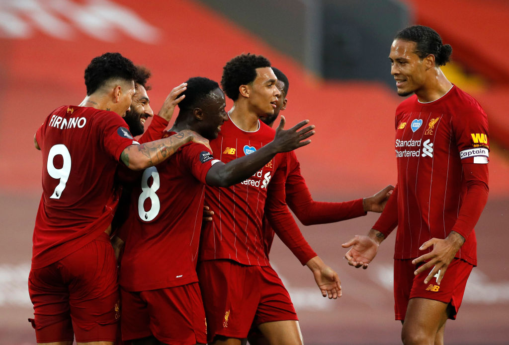 Naby Keita celebrates with teammates