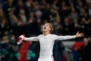 AMSTERDAM, NETHERLANDS - NOVEMBER 26: Viktor Fischer of Ajax celebrates victory after the UEFA Champions League Group H match between Ajax Amsterdam and FC Barcelona at Amsterdam Arena on November 26, 2013 in Amsterdam, Netherlands. (Photo by Dean Mouhtaropoulos/Getty Images)